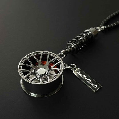 A black BBS style wheel decor flat laid on a black background