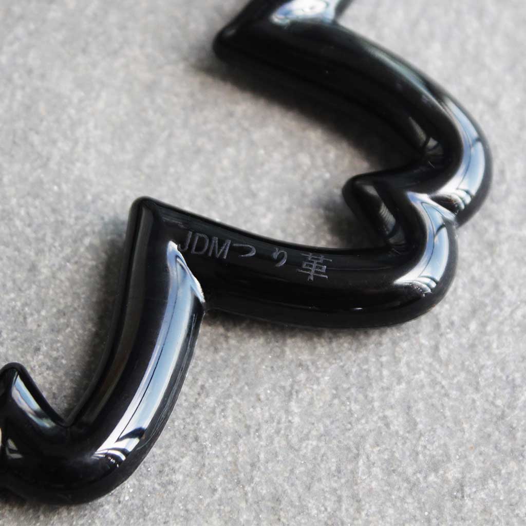 Close-up of a black sakura Tsurikawa where it says 'tsurikawa' in Japanese