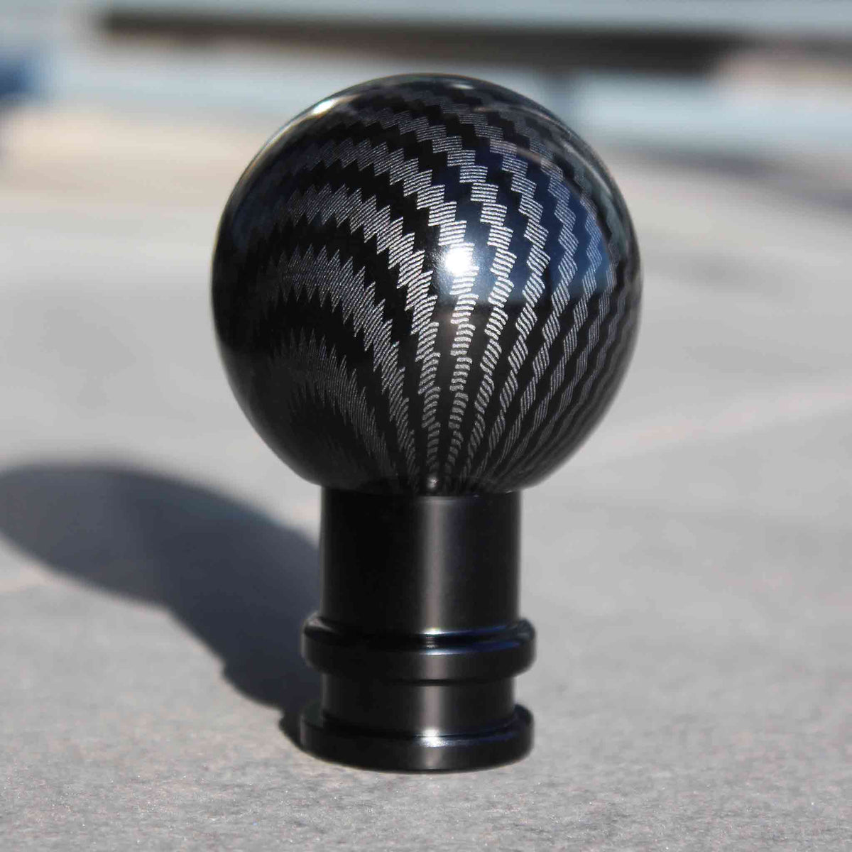 The Obsidian placed on a concrete floor in a sunny day