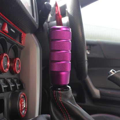 A purple shift knob installed in an automatic Toyota 86